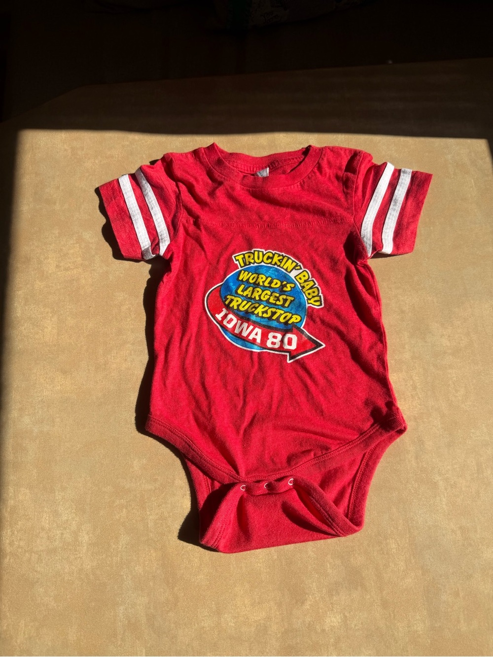 Red 'Truckin' Baby' Iowa 80 Graphic One-Piece rabbit skins 18 M